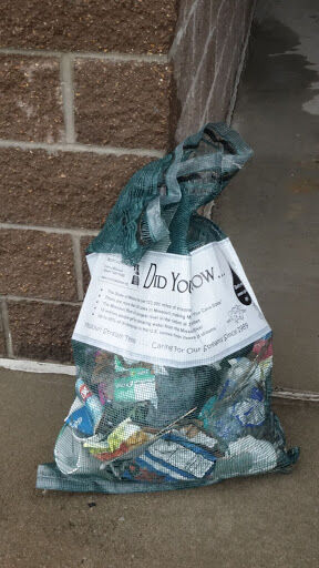 Volunteers show up in the rain for Fulton Clean Sweep Saturday